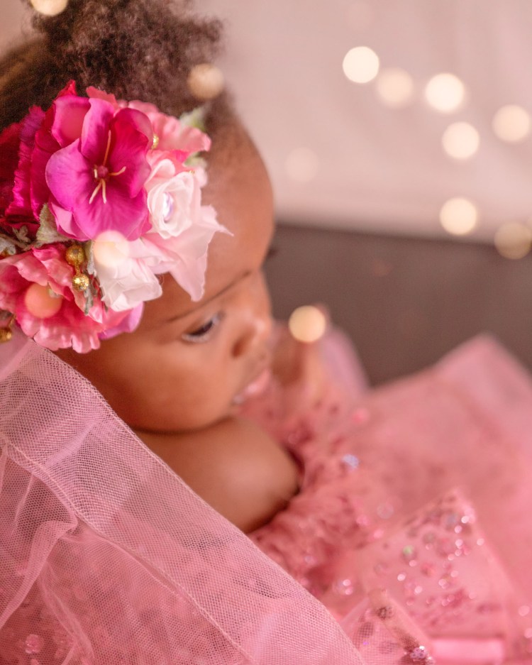 young child in glittery pink dress